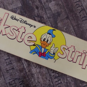 cartel publicitario vintage de Walt Disney de los años 70, cartel de tienda, pato Donald, los cómics más felices, cartel de plexiglás