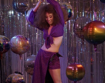 Purple sparkly three piece disco 1970s look with long skirt, shorts and tie front top boho style
