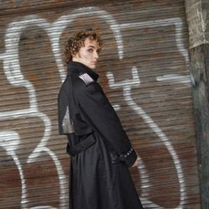 Gothic black trench coat with silver studs and pyramid accents image 1