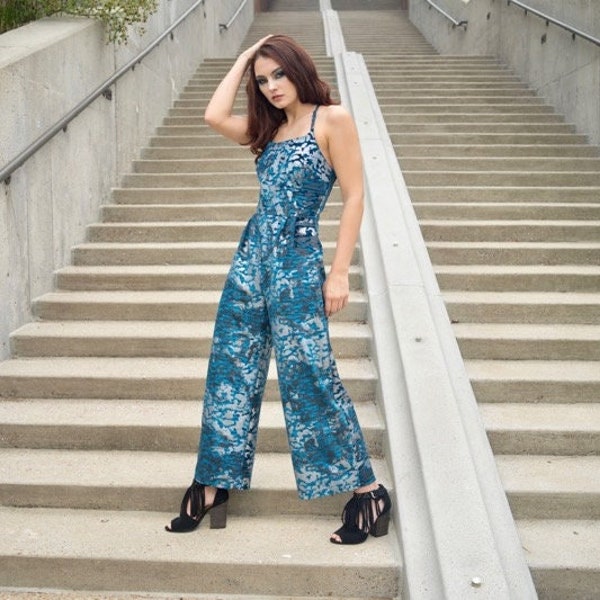 Silver and Turquoise abstract print jumpsuit with low lace up back cropped pants and pockets