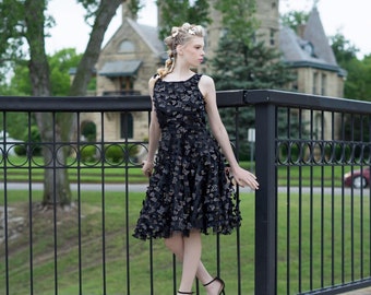 Little Black Dress with a 50s vintage flair with 3d butterflies rimmed in gold and full skirt