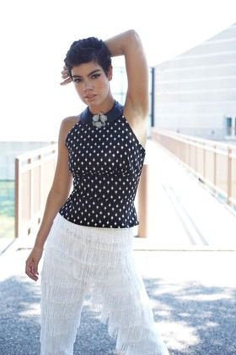 black and white dotted cotton 1950's style halter top with faux leather collar and flower pin image 1