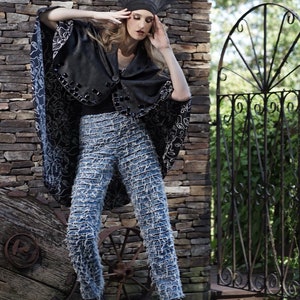 Denim jeans and pants with frayed strips attached to a black mesh. Flat front with back zipper and darts image 5