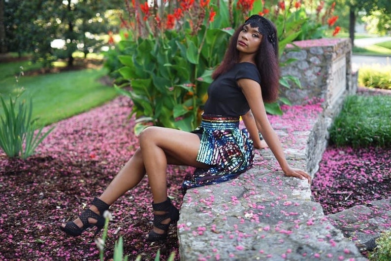 Black fitted cap sleeve dress fully lined with rainbow sequin overskirt that detaches image 4