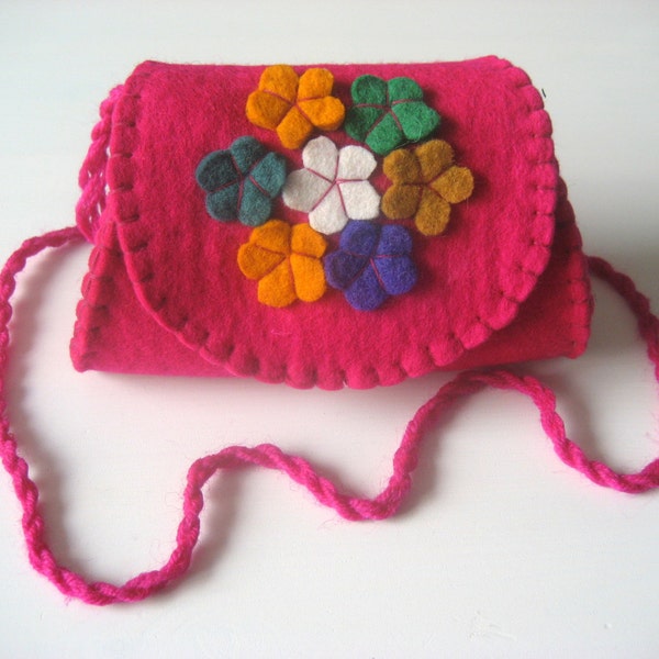 With wool embroidered felt bag.