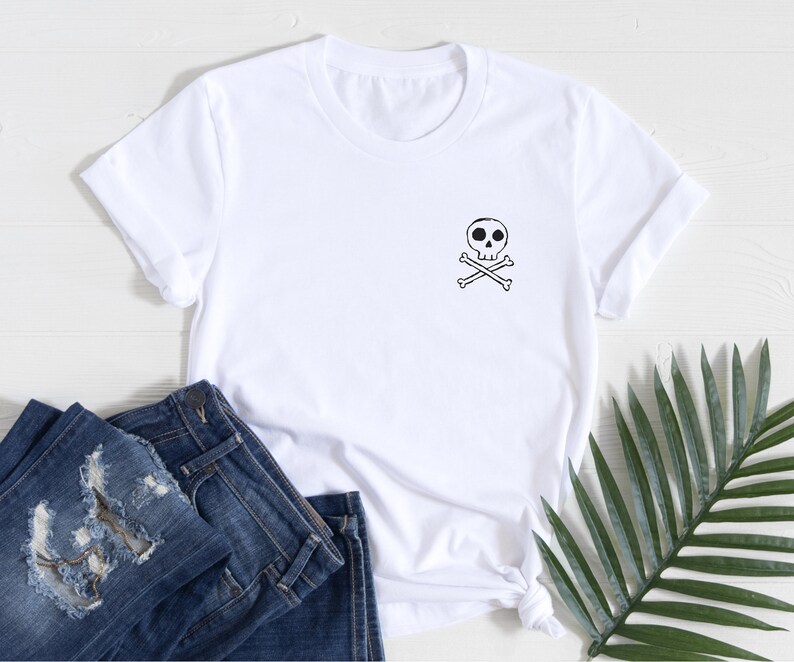 THE CAST NYC SKULL & CROSSBONES T-SHIRT - BLACK W/PINK INK