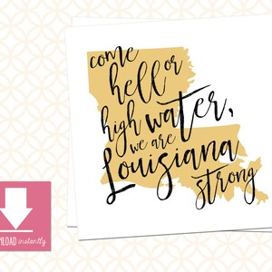 May include: A gold outline of the state of Louisiana with the text "Come hell or high water, we are Louisiana strong" in black cursive lettering.