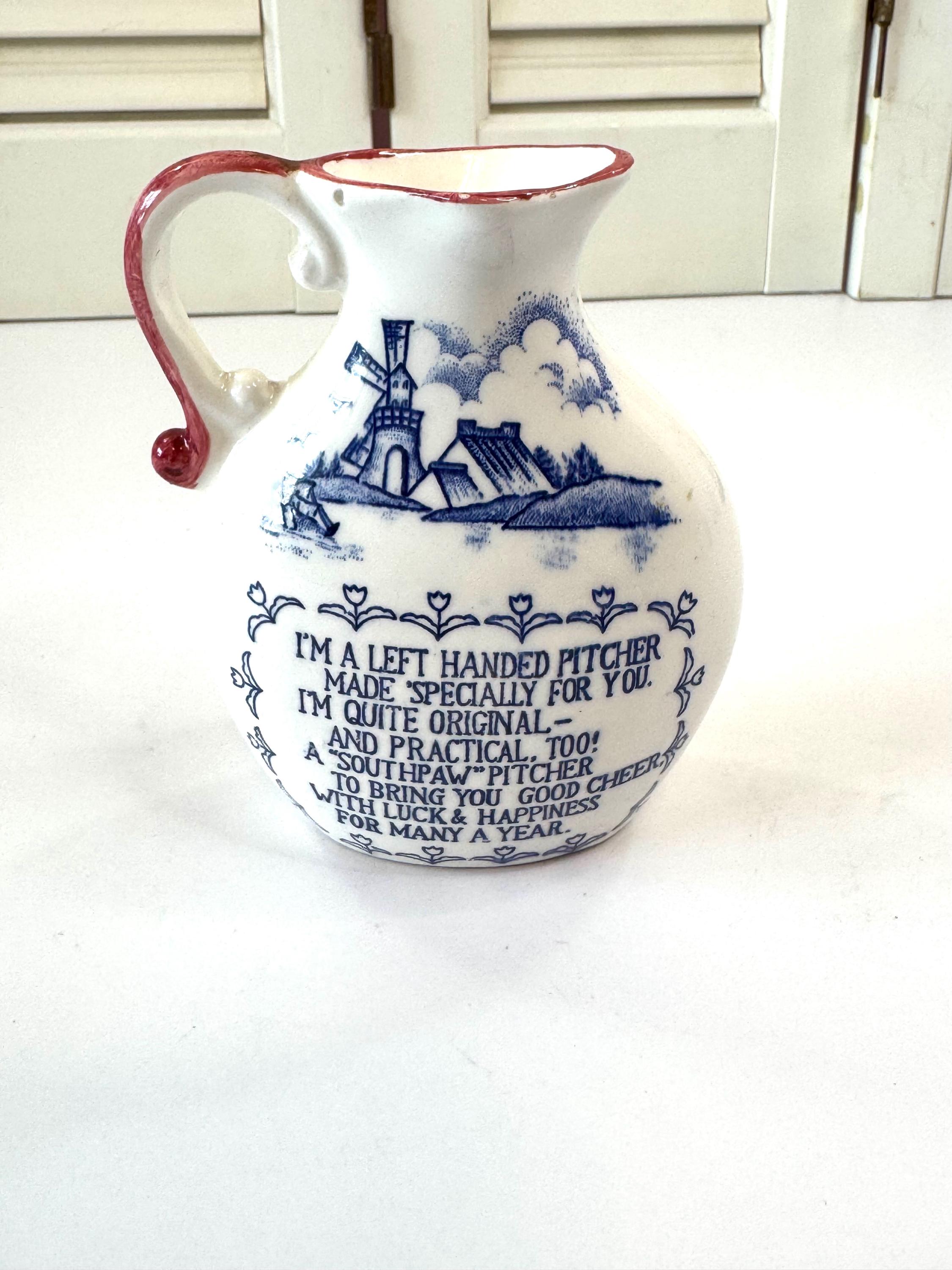 Vintage Left Handed Pitcher ~ Blue and White/Red Trim ~ Ship Image ~ Small Pitcher 4.5” high *Small chips along edge