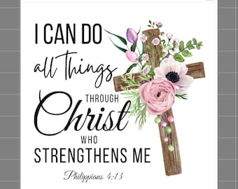 May include: A white fabric panel featuring a brown wooden cross adorned with pink and white flowers and green leaves. The text reads: I CAN DO all Things THROUGH Christ WHO STRENGTHENS ME Philippians 4:13. The top includes SaphiesFabrics.com 100% Cotton.