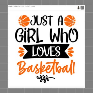 May include: A white fabric square featuring the black and orange text 'JUST A GIRL WHO LOVES Basketball' with two orange basketball icons at the top and a black decorative flourish at the bottom. The text 'SaphiesFabrics.com 100% Cotton' is visible.