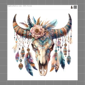 May include: A printed fabric panel featuring a bull skull adorned with a large pink flower, colorful feathers, and intricate geometric patterns in shades of blue, orange, and brown. The text SaphiesFabrics.com 100% Cotton is printed at the top.