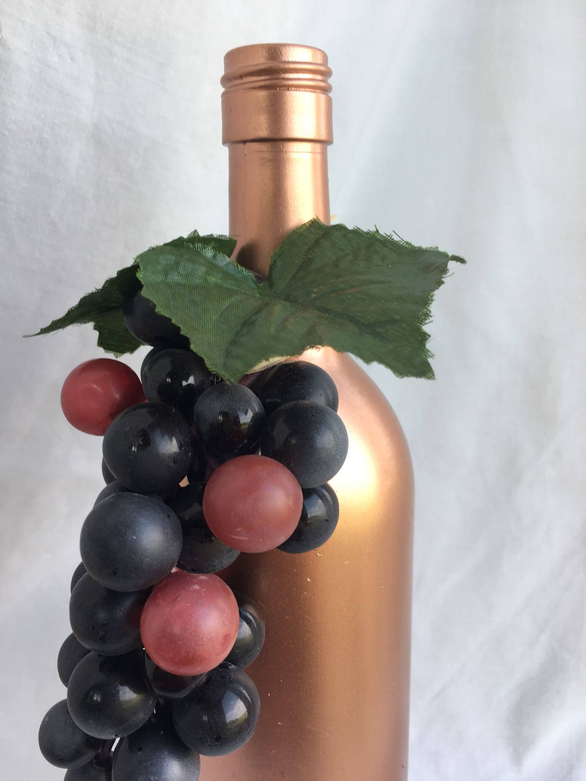 Rose gold wine bottle with grapes Etsy