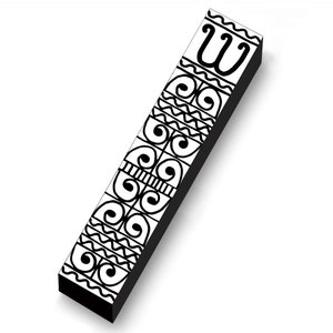 May include: A rectangular, black and white decorative object with a series of repeating patterns. The patterns include swirls, wavy lines, and a stylized letter "W". The object is angled, casting a shadow on the white background.