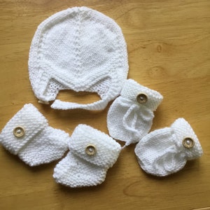 Hand knitted newborn baby helmet, booties and mittens set