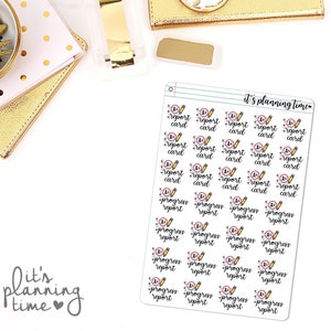May include: A sheet of stickers with a white background and black and red text. The stickers feature the words "report card" and "progress report" with a pencil icon. The text "it's planning time" is at the top of the sheet.