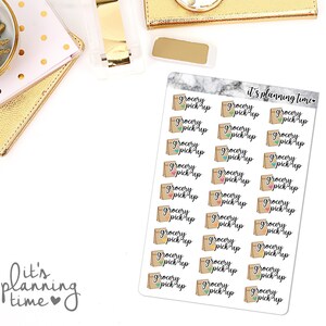 May include: A sheet of stickers with the text "it's planning time" and multiple brown paper bag stickers with the text "grocery pick up" and a small heart design in various colors.