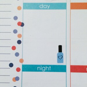 May include: A blue nail polish bottle with a white heart on the label. The bottle is on a white background with the words "day" and "night" written in blue.