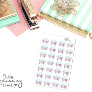 May include: A sheet of 24 bathtub stickers with a pink and gray design. The stickers feature a bathtub with bubbles and a pink heart. The text "it's planning time" is on the bottom left corner of the sheet.