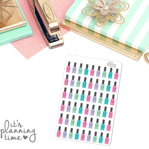 May include: A sheet of planner stickers featuring 36 nail polish bottle illustrations in various colors, including pink, blue, green, and purple. Each bottle has a small heart on the cap. The text "it's planning time" is written in cursive at the bottom left corner of the sheet. The text "it's planning time" is written in cursive at the top right corner of the sheet.