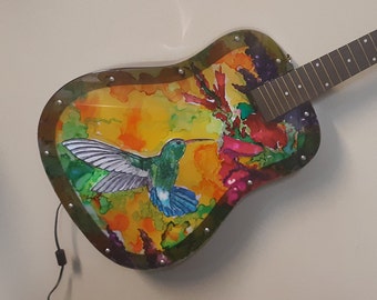 Guitar Lamp # 136. Hummingbird in garden. Color changing LED back lit plexiglas top.