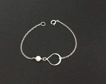 Delicate Infinity Bracelet. White Pearl Bracelet. Sterling Silver Jewelry. Friendship Bracelet.Layering Bracelet. Minimal Bracelet.