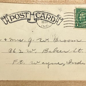 May include: A vintage postcard with a green stamp featuring a portrait of George Washington. The postcard is addressed to Mr. & Mrs. J.W. Broom, 362 W. Baker St., Ft. Wayne, Ind.