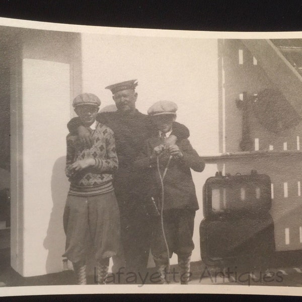 1920s Black and White Photograph of The Boatswain's Mate and Two Small Passengers, US Navy Petty Officer, Military Ship