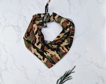May include: A green, brown, and black camouflage bandana with a triangular shape.