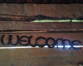 Horseshoe welcome sign