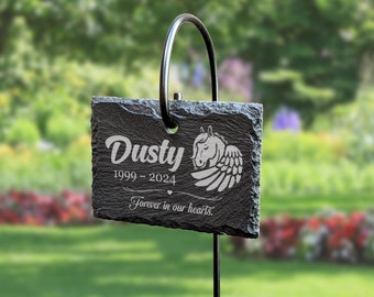 May include: Black slate garden marker with a metal ring for hanging. The marker is engraved with the text "Dusty 1999-2024 Forever in our hearts." and a horse with wings.