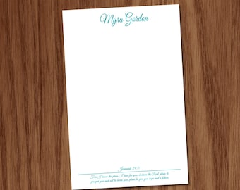 May include: A white rectangular stationery sheet featuring the name Myra Gordon in teal script at the top. The bottom section includes the text Jeremiah 29:11 followed by the full verse in teal font, underlined by a thin horizontal teal line.