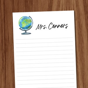 May include: A white lined notepad with a blue and green globe illustration and the text "Mrs. Connors" at the top.