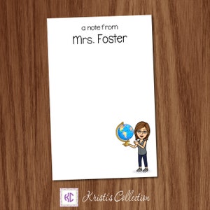 May include: A white notecard with the text "a note from Mrs. Foster" at the top. A cartoon image of a woman holding a globe is at the bottom of the card.