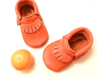 orange baby shoes