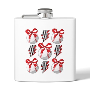 May include: White flask with a silver cap and hinge. The flask is decorated with baseballs tied with red bows and black and white checkered lightning bolts. The baseballs have red stitching.