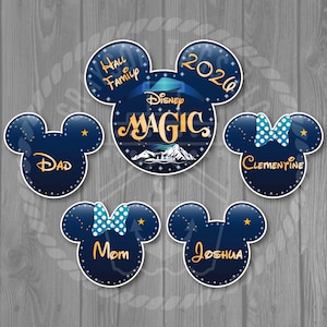 May include: Navy blue Mickey Mouse-shaped family vacation stickers. The central sticker reads "Disney MAGIC" with a mountain scene. Other stickers say "Dad", "Mom", "Joshua", and "Clementine". The top sticker says "Hall Family 2026".
