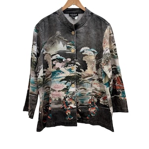 May include: A black denim jacket with a mandarin collar and long sleeves. The jacket features a colorful, detailed print of a Japanese landscape with figures, trees, and mountains. It has wooden buttons and the brand name "CITRON" on the back of the collar.