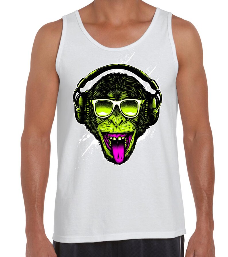 May include: A white tank top featuring a green monkey wearing sunglasses and headphones. The monkey has its tongue sticking out and is smiling.