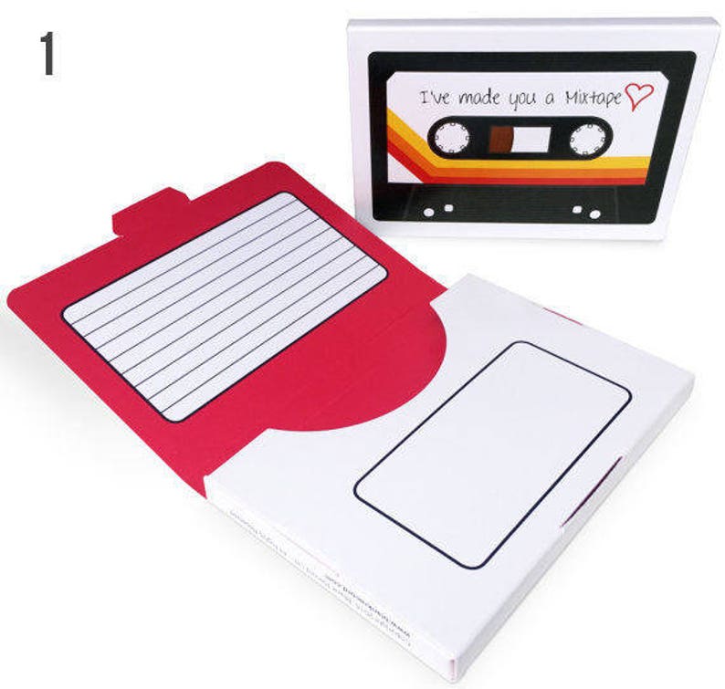 May include: A white box with a red interior and a cassette tape design that reads "I've made you a Mixtape" with a heart. The box is open, revealing a lined paper area and a blank rectangle.