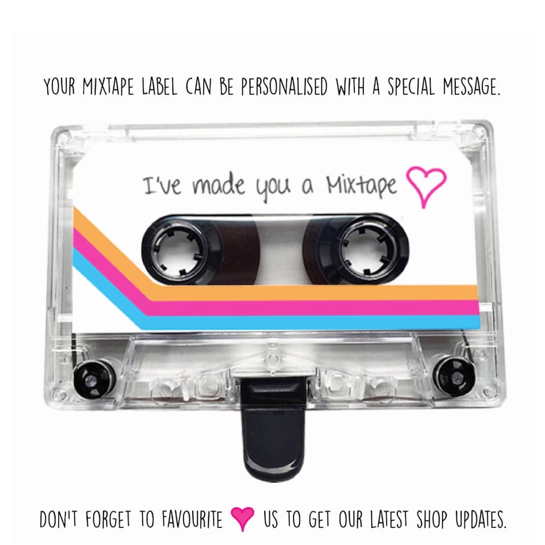 May include: A clear plastic cassette tape with a white label. The label has a pink, orange, and blue striped design. The text on the label reads "I've made you a Mixtape" with a pink heart.