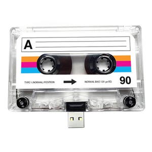 May include: A clear plastic cassette tape with a black USB drive attached. The cassette tape has a label that says "A" and "90". The cassette tape is a type 1 normal position and has a normal bias 120 us EQ.