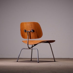 Evans ‘LCM’ Oak Lounge Chair Metal by Eames