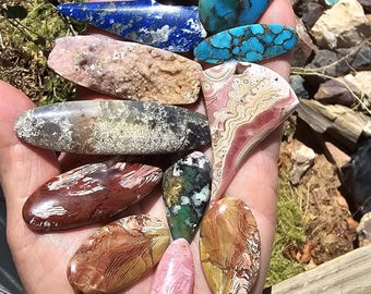 Parcel of 12 unique hand cut stones    P-1001