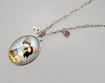 Necklace with cabochon couple