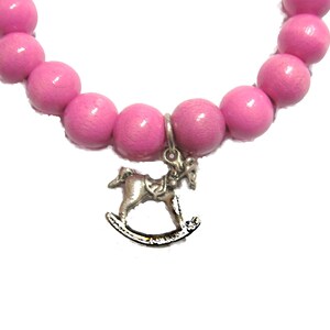 Pink bracelet for girls with pendant image 2