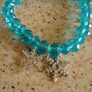 Bracelet with blue crystal and star pendant image 3