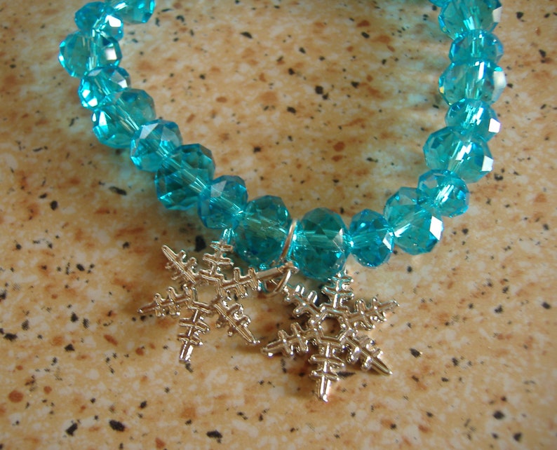 Bracelet with blue crystal and star pendant image 3