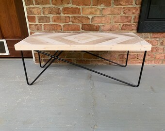 Beautiful mirrored chevron style coffee table with asymmetrical black hairpin legs