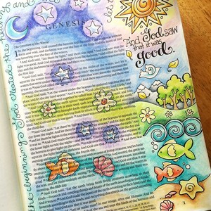 May include: A colourful illustration of the first chapter of Genesis from the Bible. The image features a blue sky with stars, a yellow sun, a green landscape with trees, and a blue ocean with fish. The text "And God saw that it was good." is written in a whimsical font.