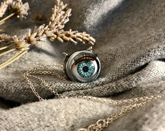 Aqua Blinking Doll Eye Necklace, Creepy Moving Doll, Turquoise Eyes with eyelashes, Silver necklace, Oddity Curiosity jewellery